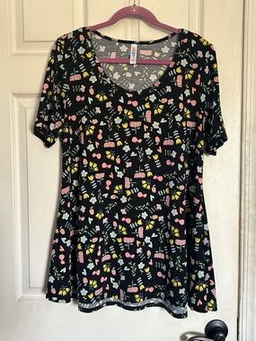 Lularoe pastel pattern floral short sleeve swing tee size large